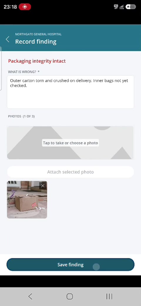 QI-Tracker on a phone: a failed check with a photo of the damaged carton